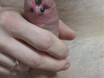 Cock Sounding slow motion moment deep sound penis piercing